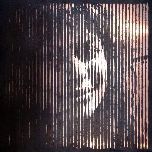 Portrait made of etched and patinated copper